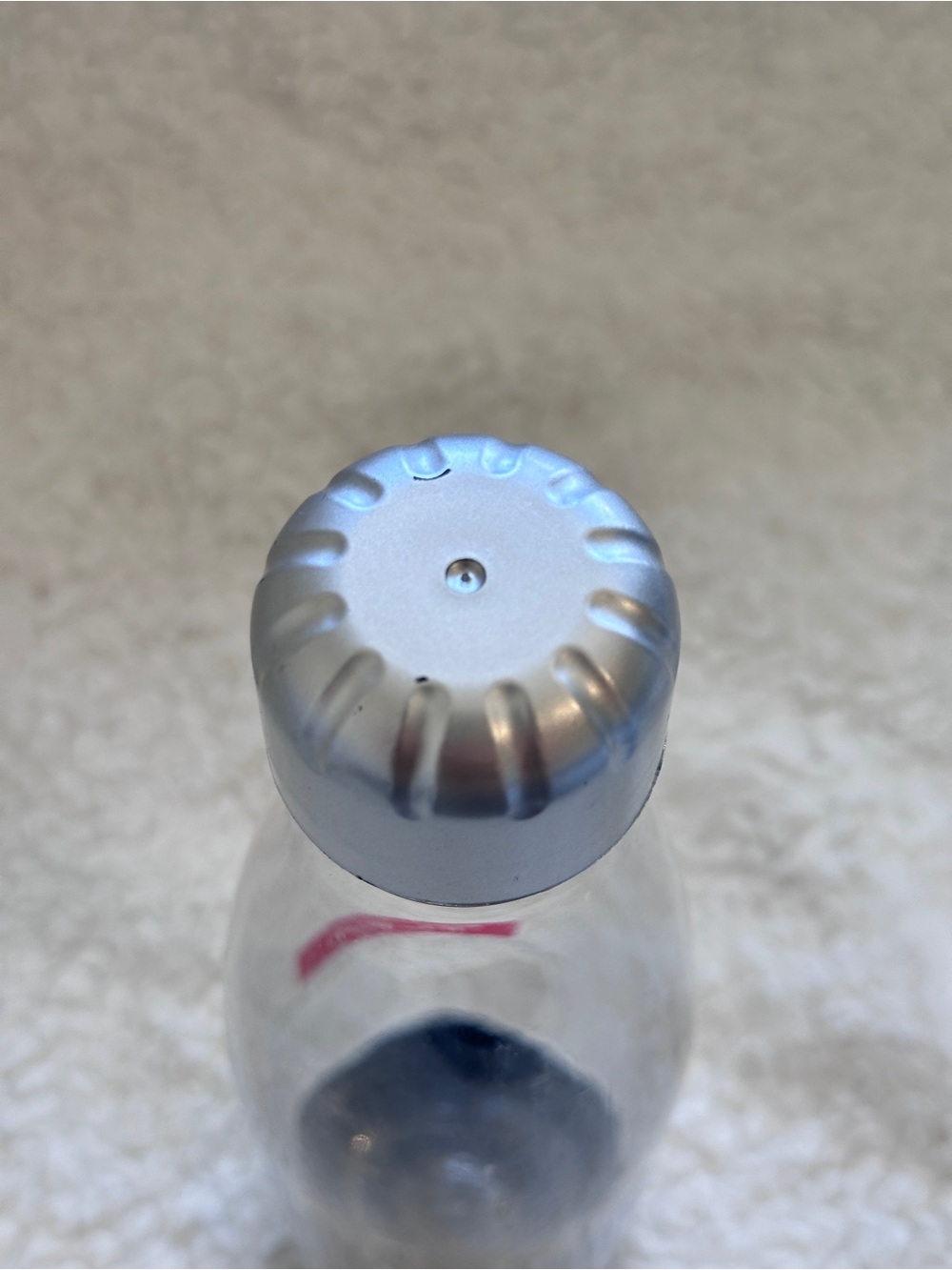 Tumi Clear Water Bottle with Silver Accents and Red Logo - Picture 5 of 6